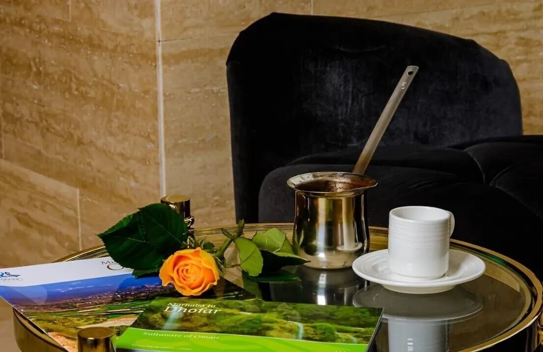 Arabic coffee and a rose on a tray