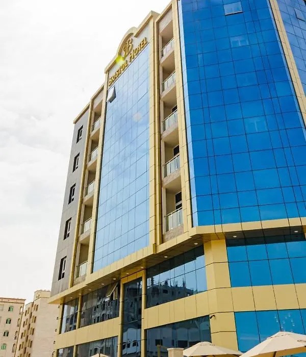 The blue glass façade from the street