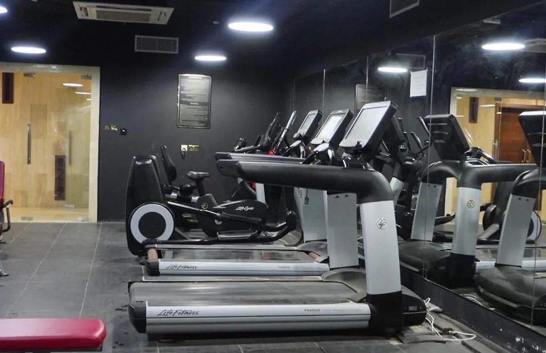 Fitness centre with a row of treadmills