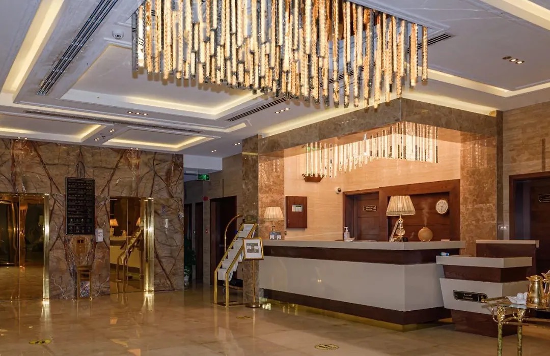 Reception desk under a chandelier